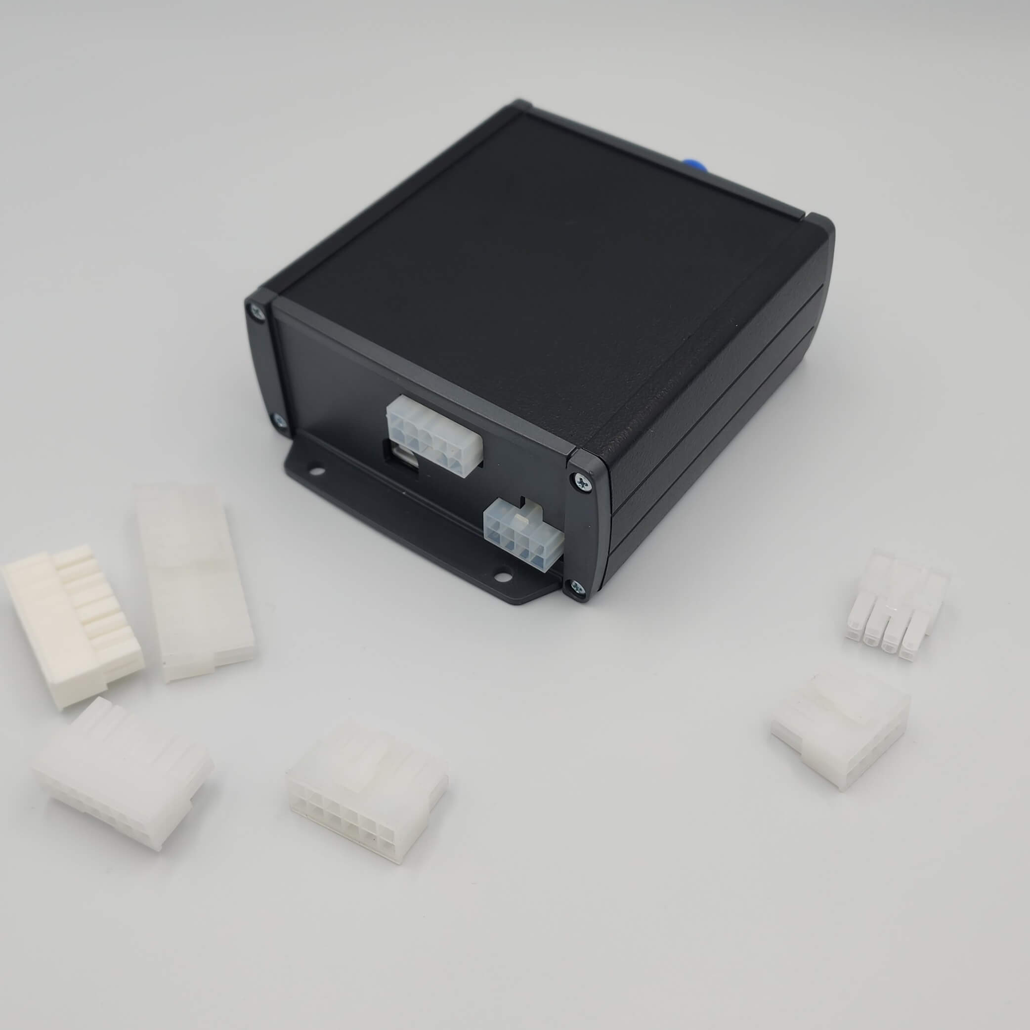 A black electronic device with a blue switch, Boostec EFI Xtreme