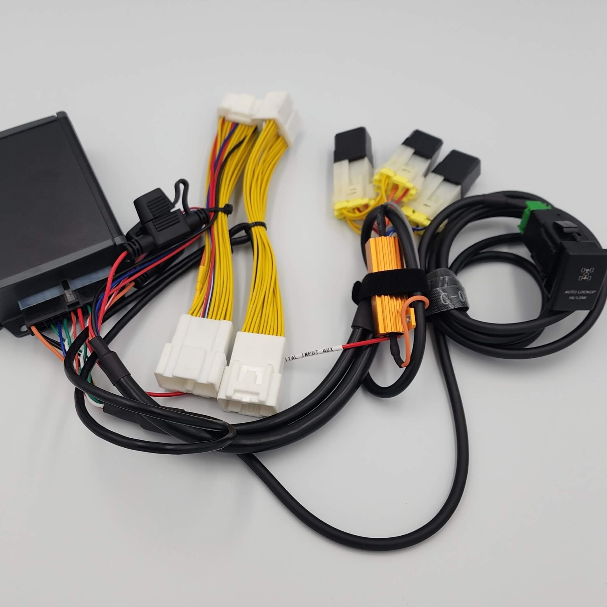 Computer cables and power supply unit with connectors on white.