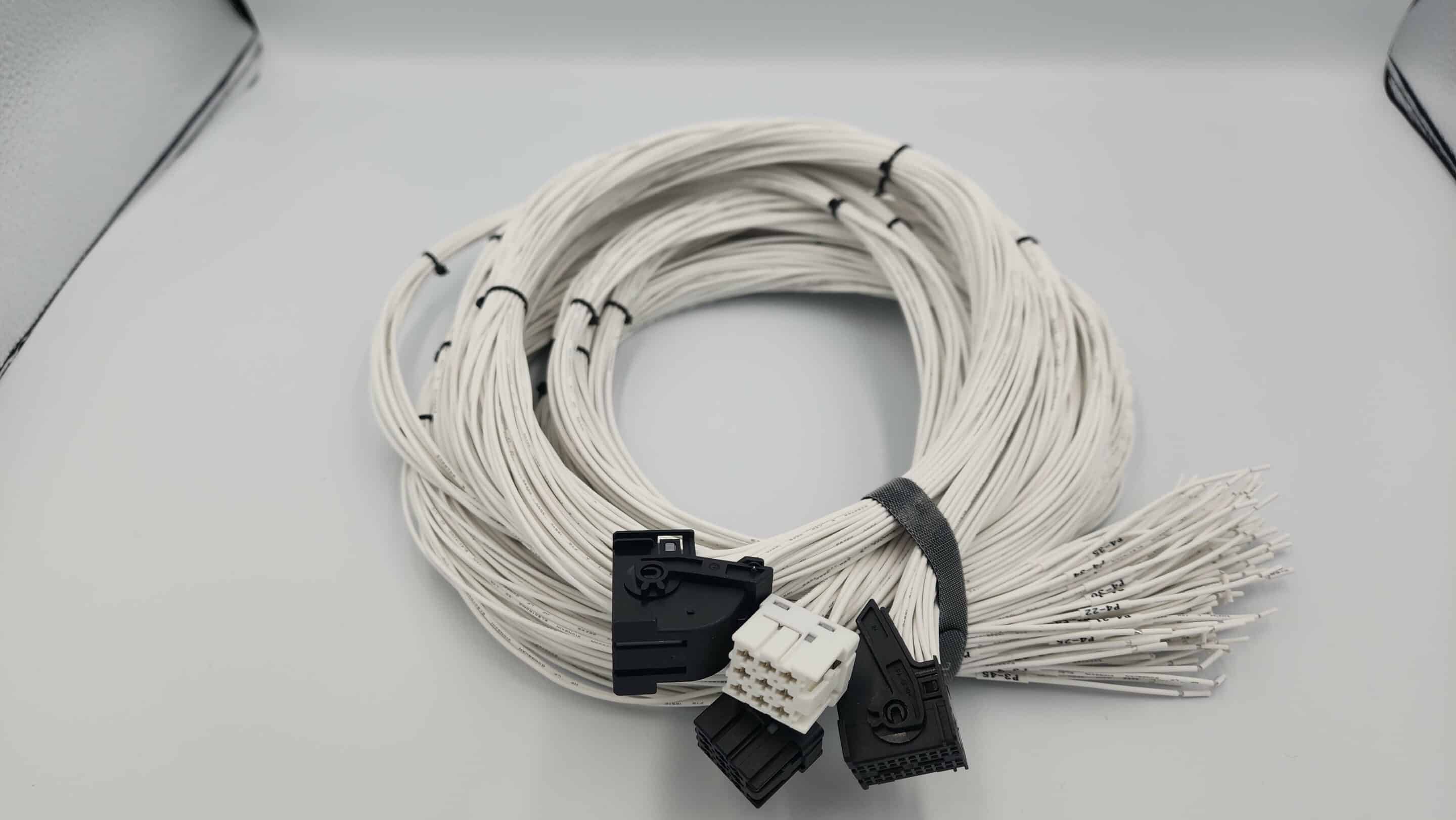 Boostec ProXtreme cable bundle with black connectors on white surface.