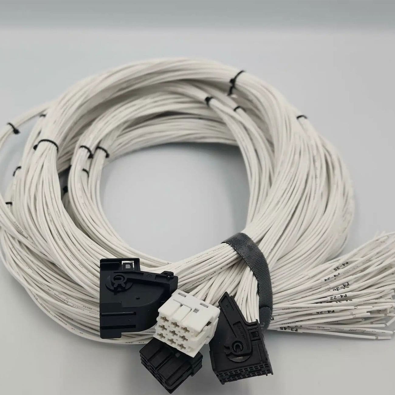 Boostec ProXtreme cable set with clips and connectors on gray.