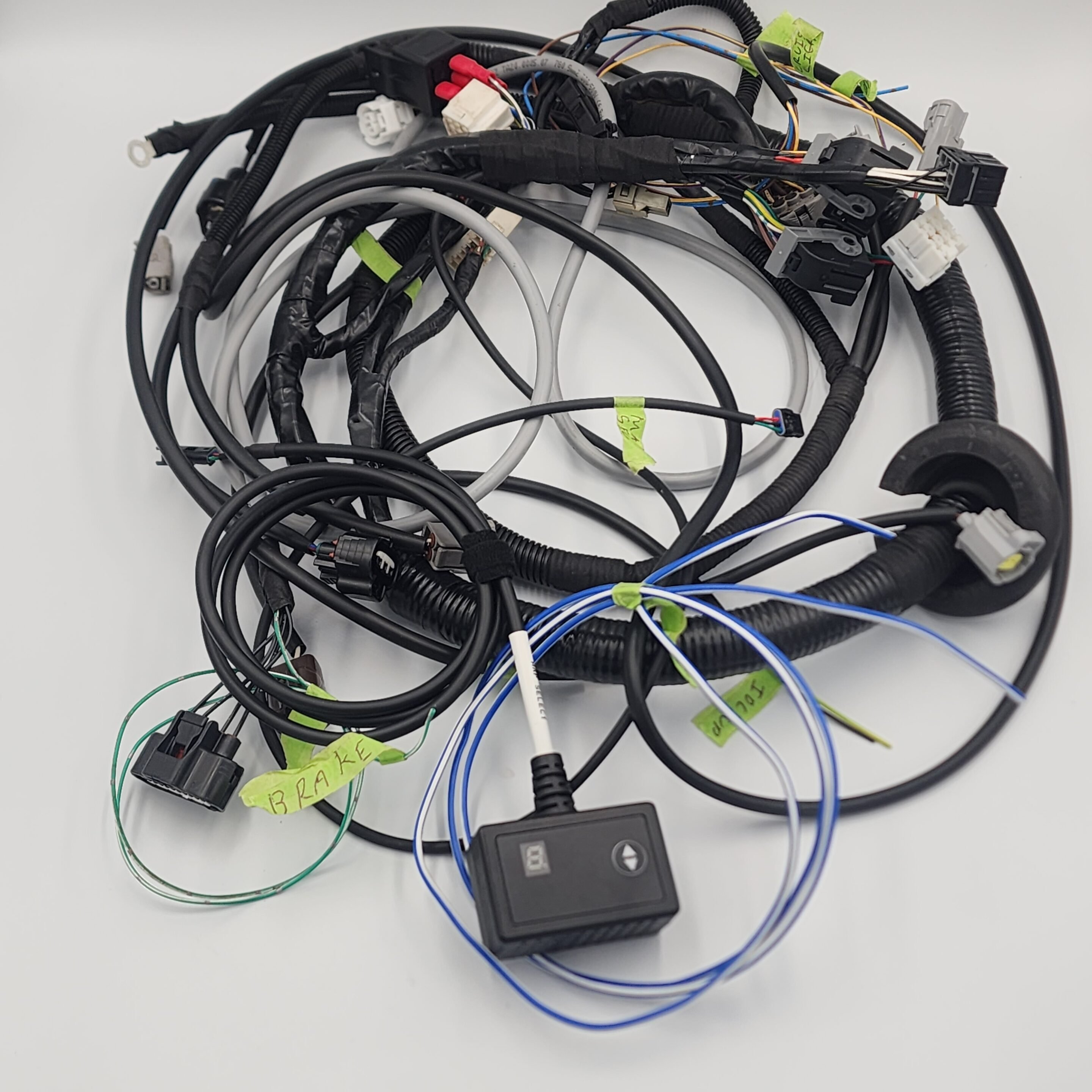 Labeled vehicle wiring harness with control switch and connectors.