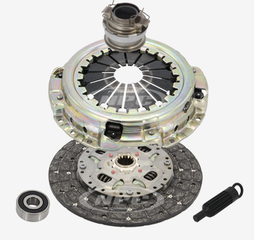 Clutch kit with pressure plate, disc, bearing, and tool.