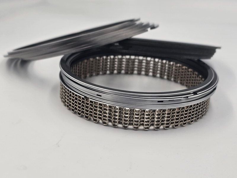 20241227_104603 "Close-up of HDFTE billet piston with mesh-like structure."